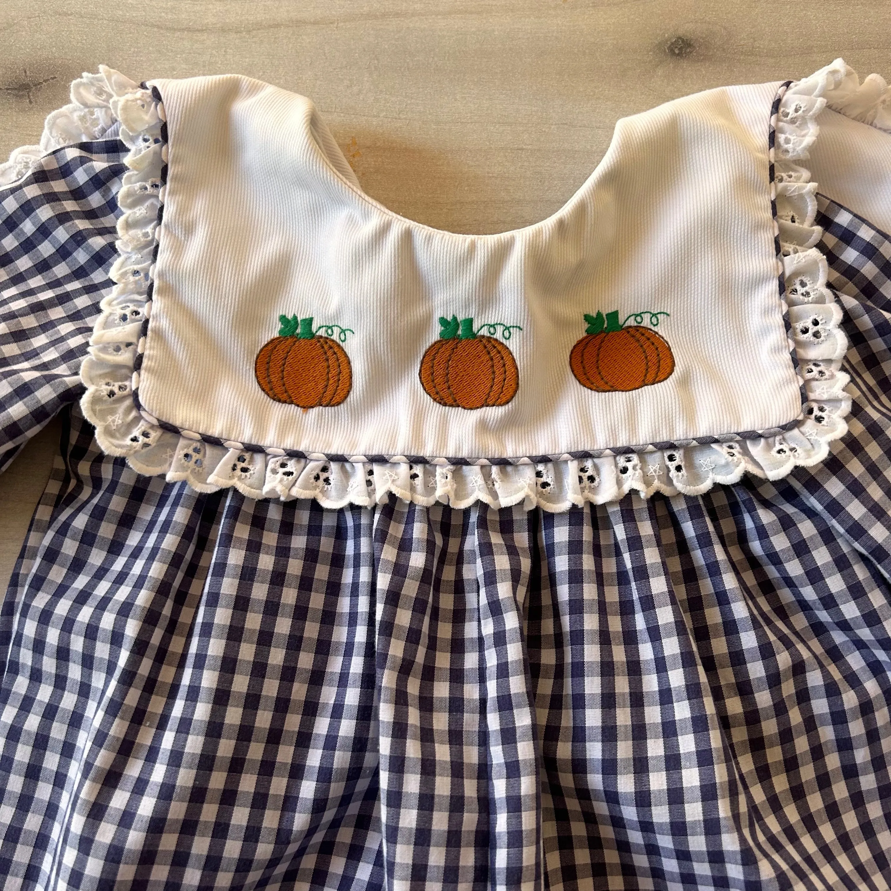 Cecil And Lou Blue Gingham Pumpkin Smocked Bubble Romper