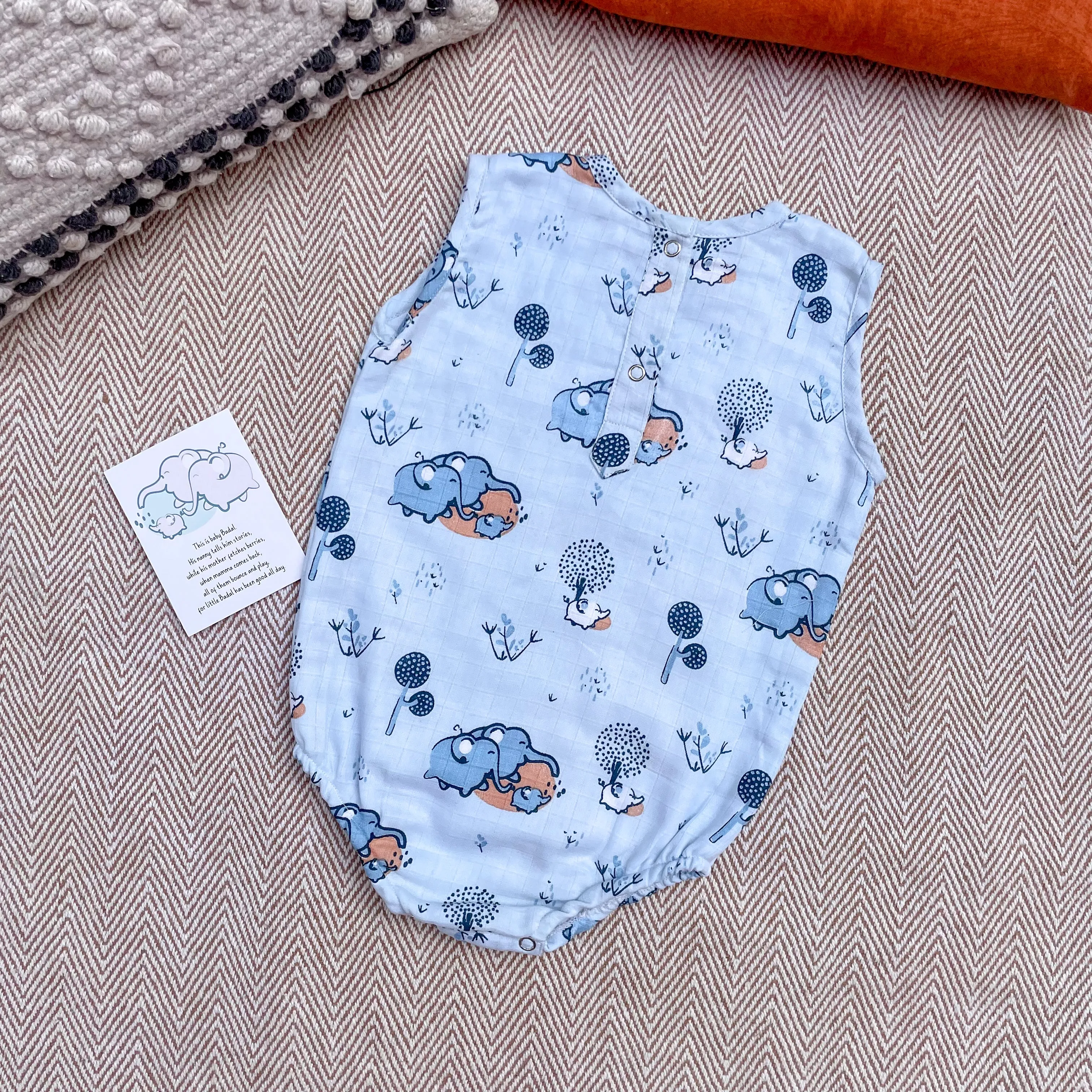 Elephant Clan Muslin Onesie