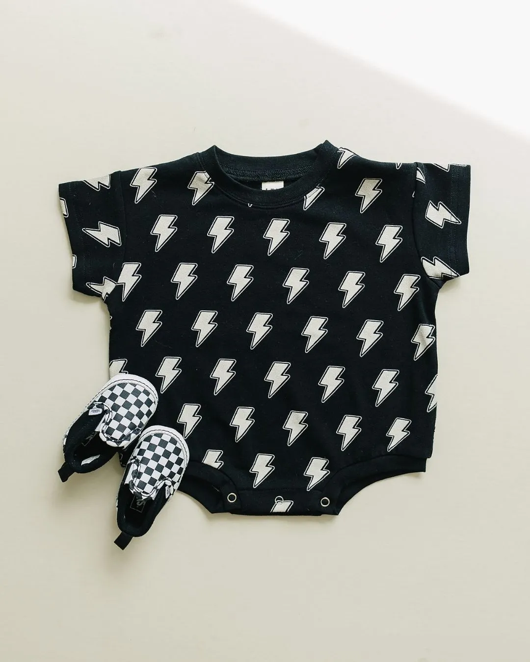 LPK Short Sleeve Bubble Romper - Black Bolts