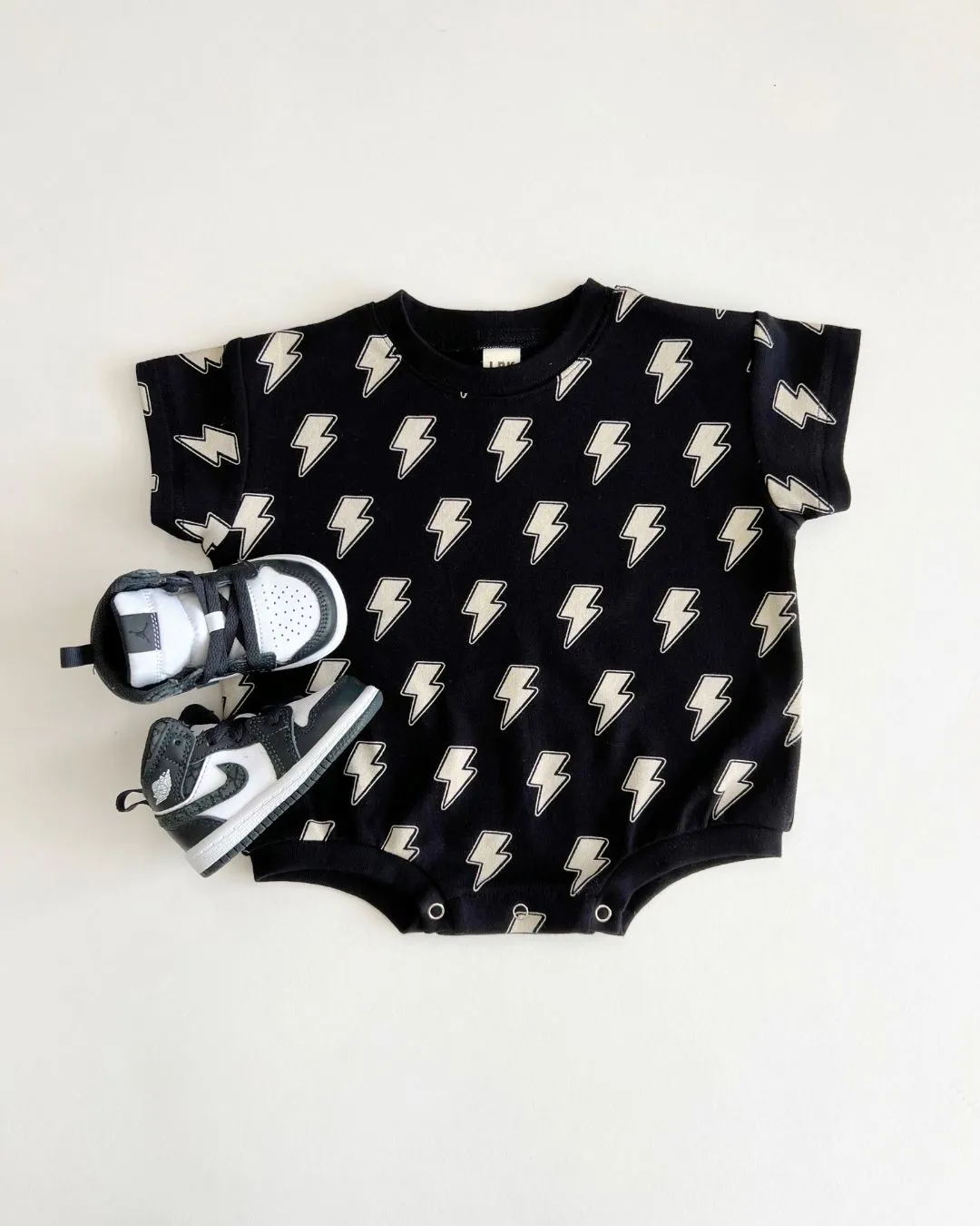 LPK Short Sleeve Bubble Romper - Black Bolts