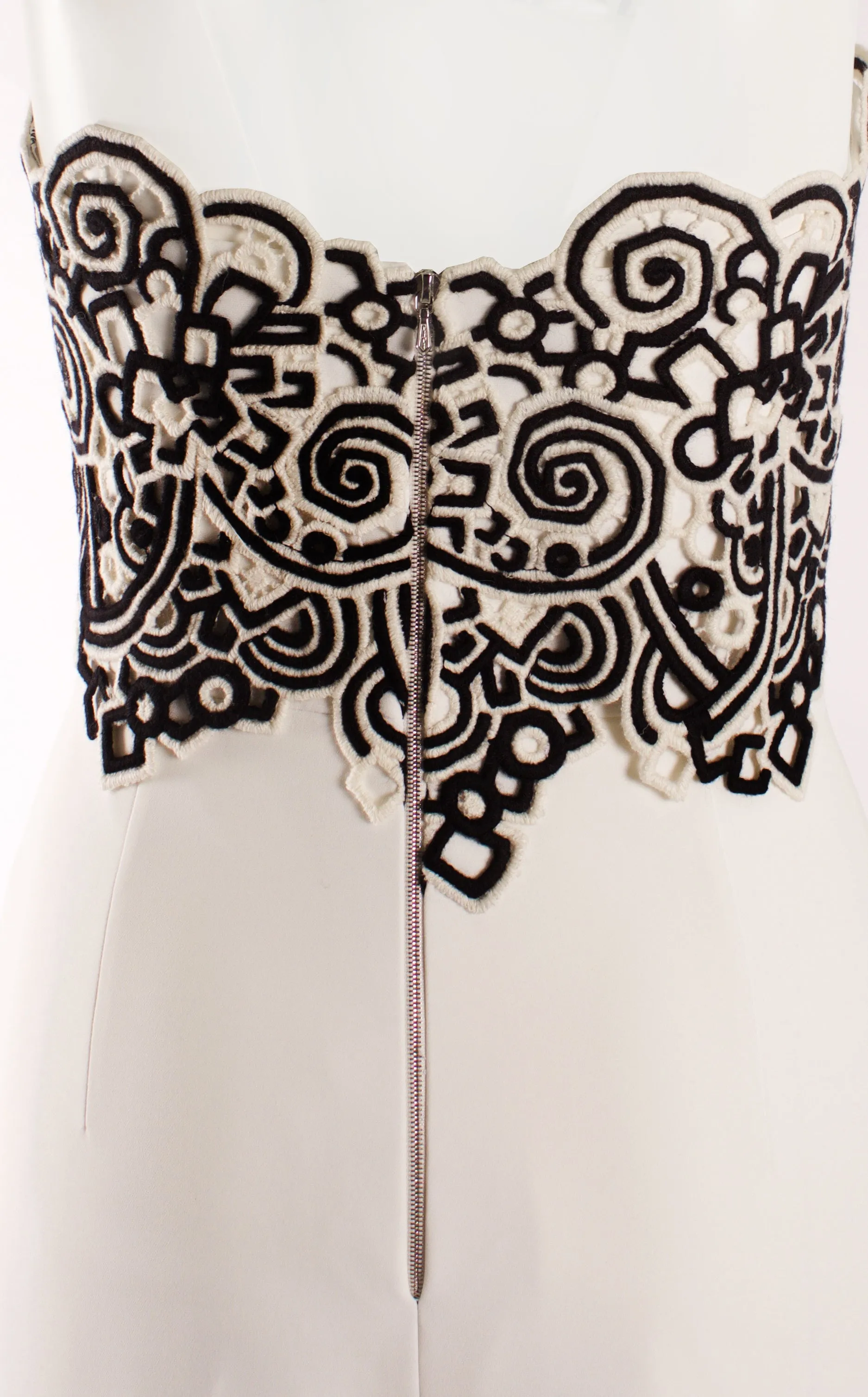 STRAPLESS JUMPSUIT WITH MACRAME DETAIL